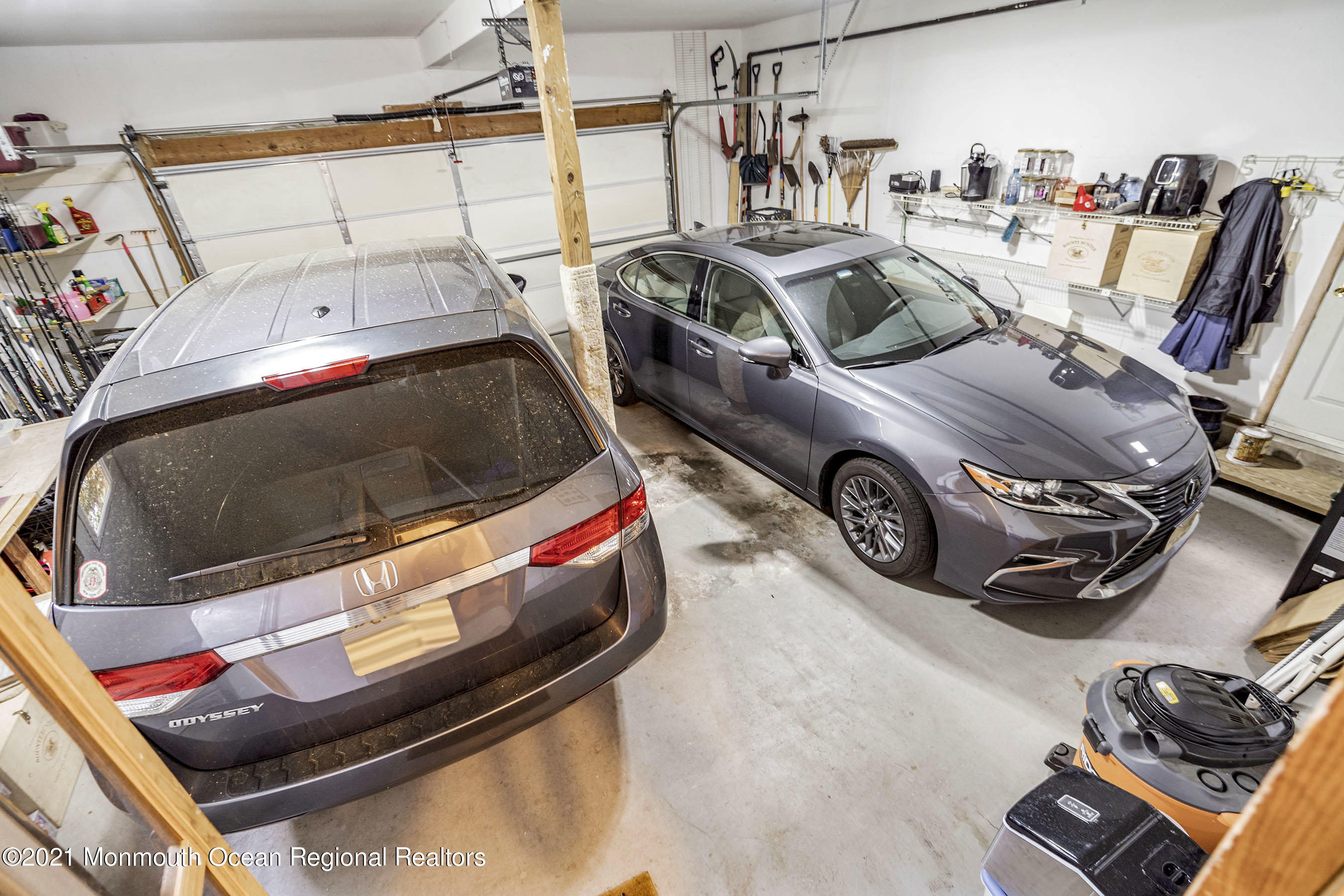 617 Turkey Point Road Brick, NJ 08724 - Photo 43 of 43 a car parked in garage
