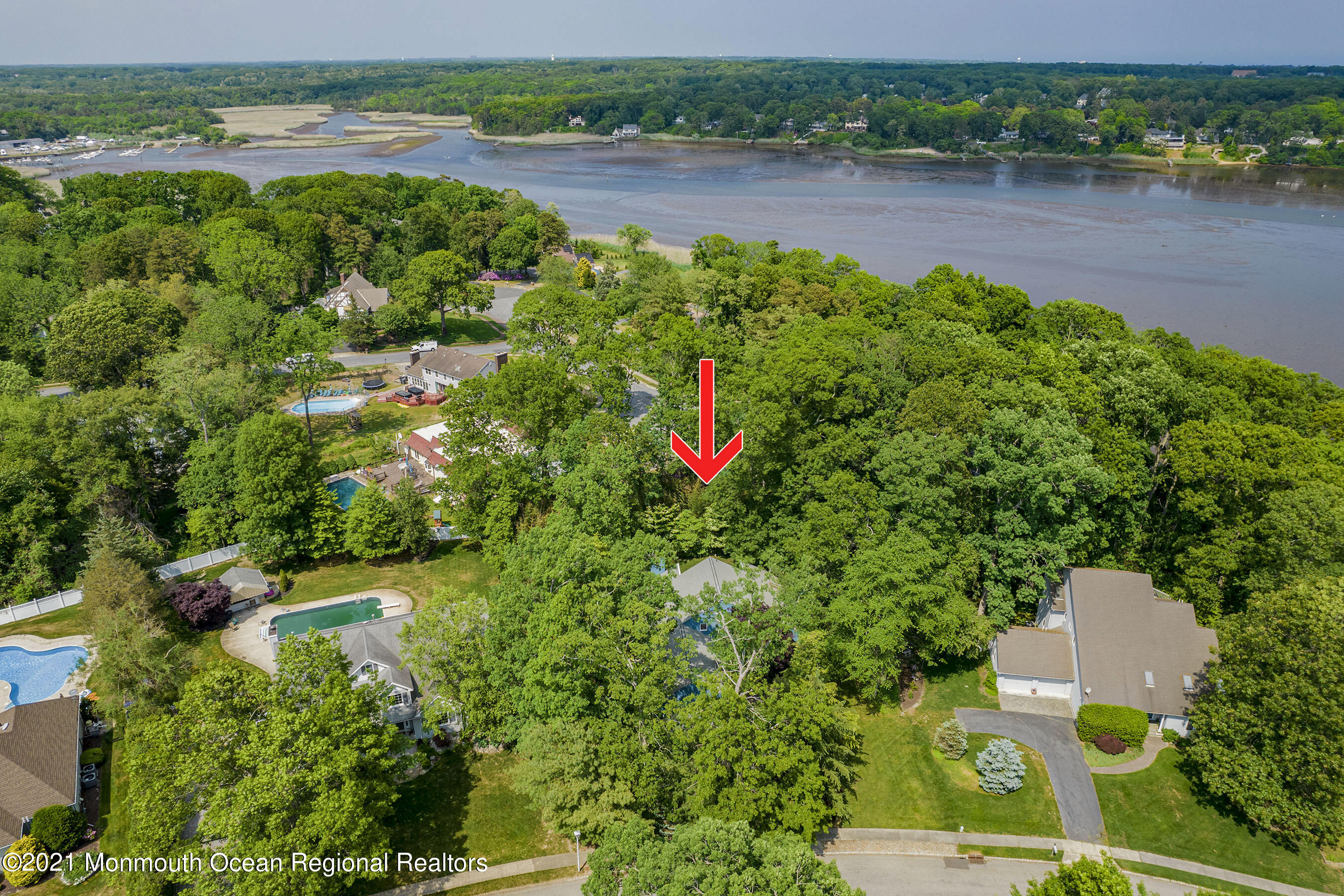 617 Turkey Point Road Brick, NJ 08724 - Photo 6 of 43 an aerial view of a house with a yard and lake view