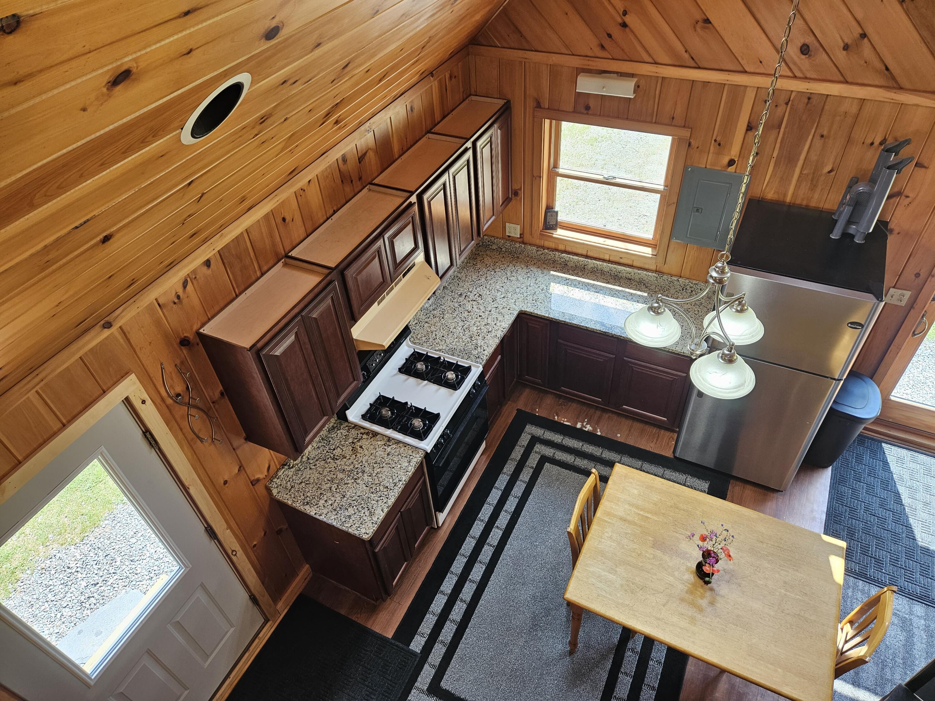 34 N Road Shirley Mills, ME 04485 - Photo 21 of 47 Looking down from loft