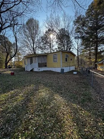 a house view with a backyard space