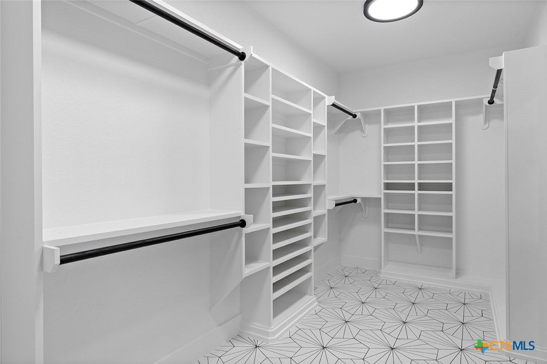 1220 Hadley Lane Copperas Cove, TX 76522 - Photo 16 of 17 a view of walk in closet with empty racks