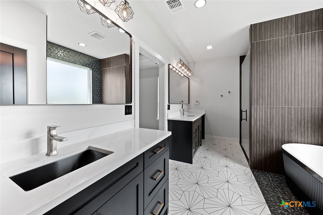 1220 Hadley Lane Copperas Cove, TX 76522 - Photo 9 of 17 a kitchen with a sink and cabinets
