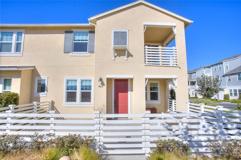 163 Patria Rancho Mission Viejo, CA 92694 - Photo 1 of 25 a front view of a house with a yard