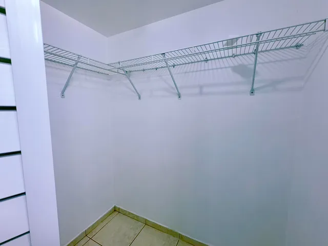 a view of a room with racks on the wall