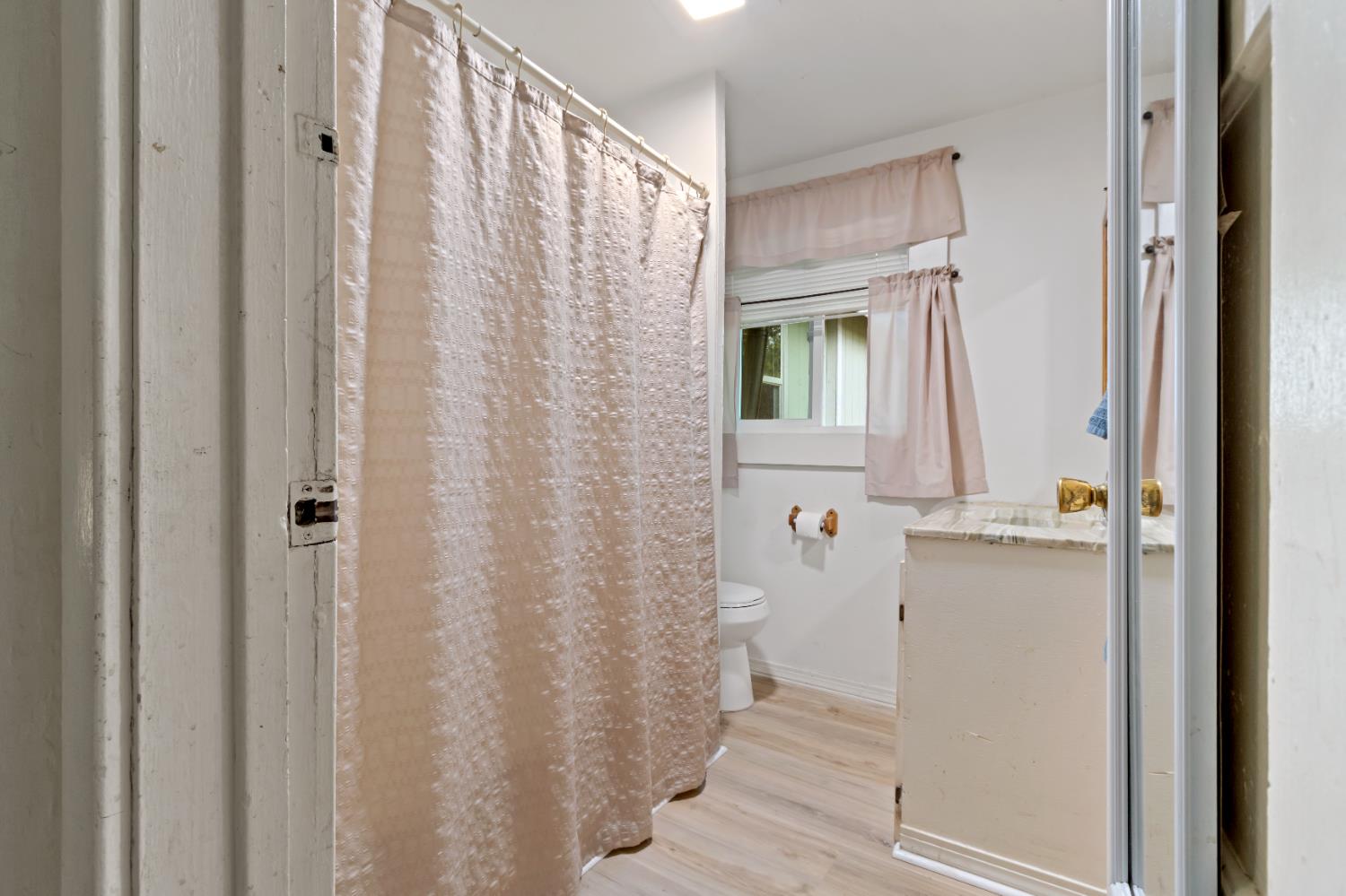 6641 Ribbon Lane Placerville, CA 95667 - Photo 13 of 21 a bathroom with a granite countertop sink and a mirror