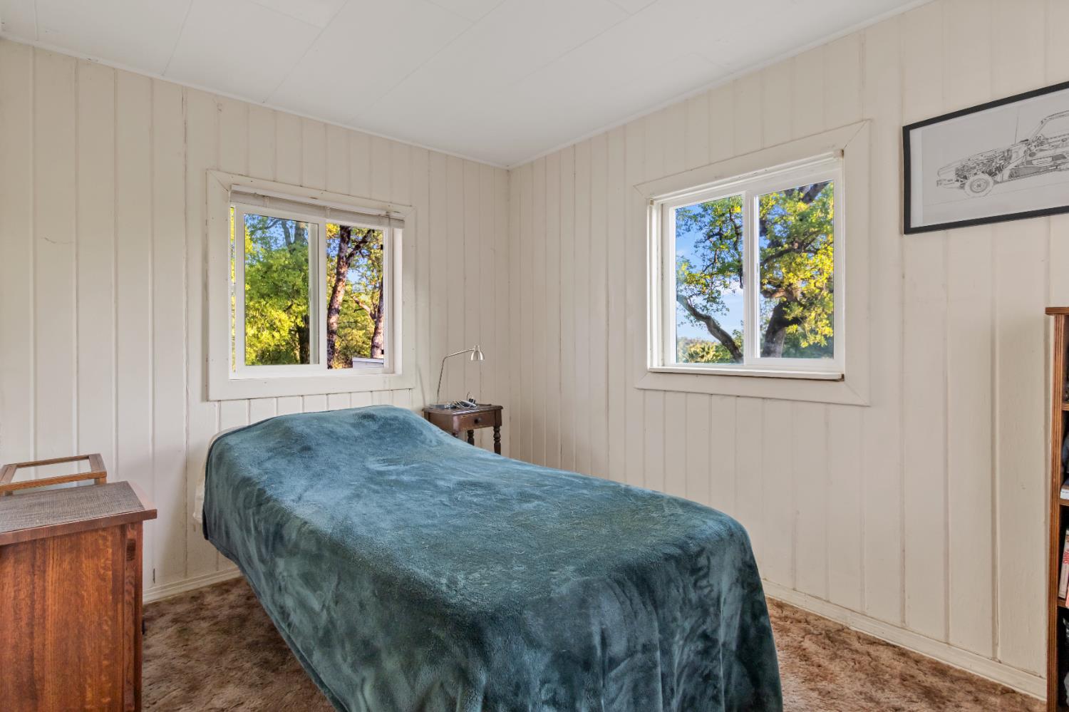 6641 Ribbon Lane Placerville, CA 95667 - Photo 14 of 21 a bedroom with a bed and a window