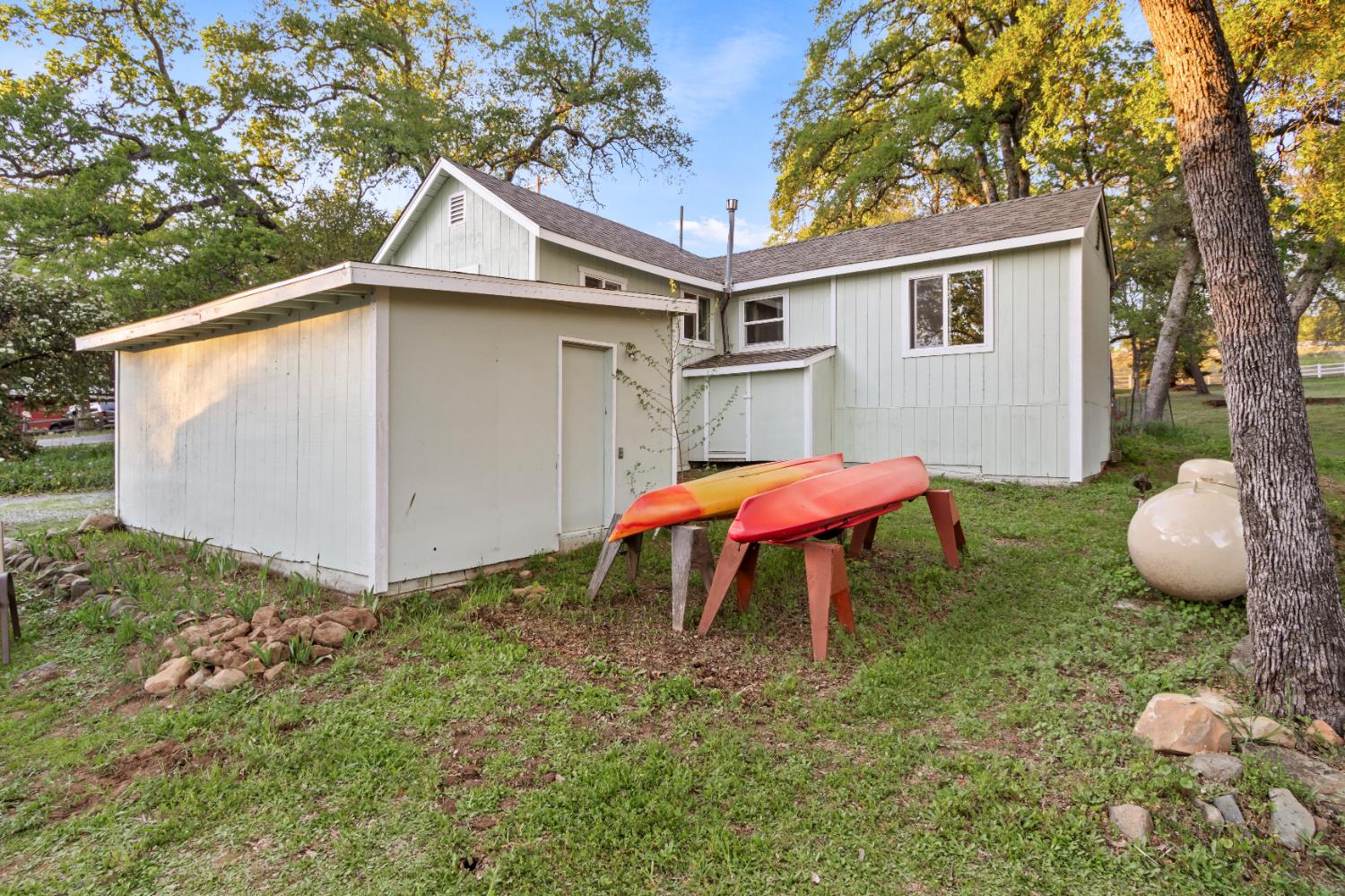 6641 Ribbon Lane Placerville, CA 95667 - Photo 16 of 21 a view of a house with backyard and furniture