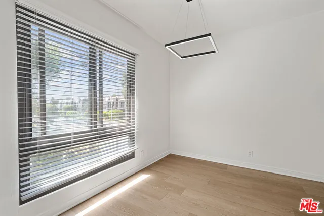 a view of a room that has a window in it