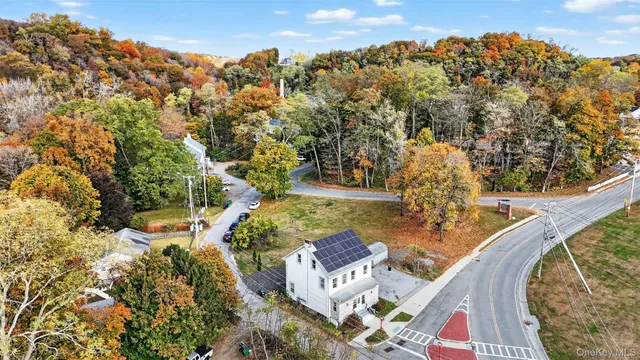 an aerial view of a house with a garden
