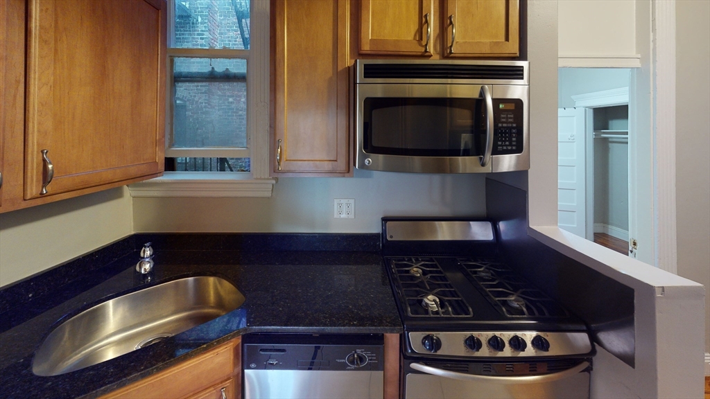 65 Burbank Street, Unit 21 Boston, MA 02115 - Photo 1 of 9