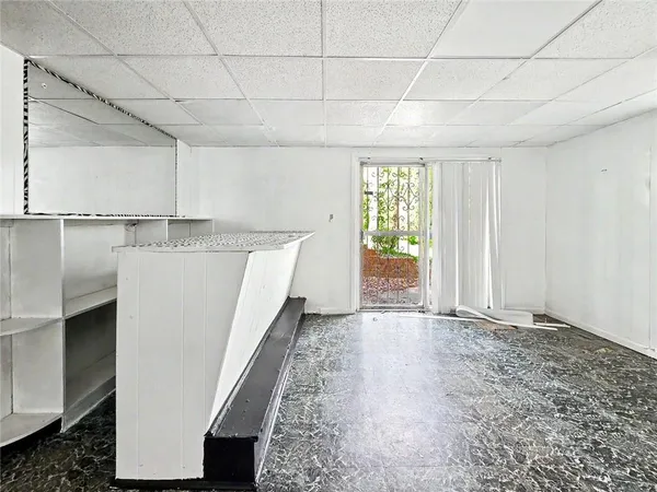 a view of a kitchen with a sink