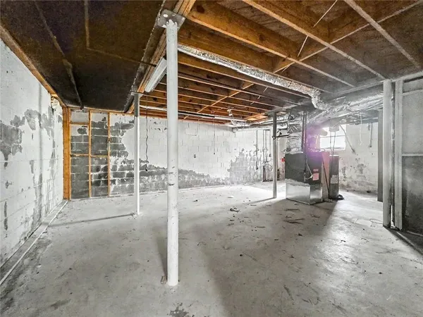 a view of a room with wooden walls