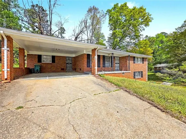 front view of a house with a patio