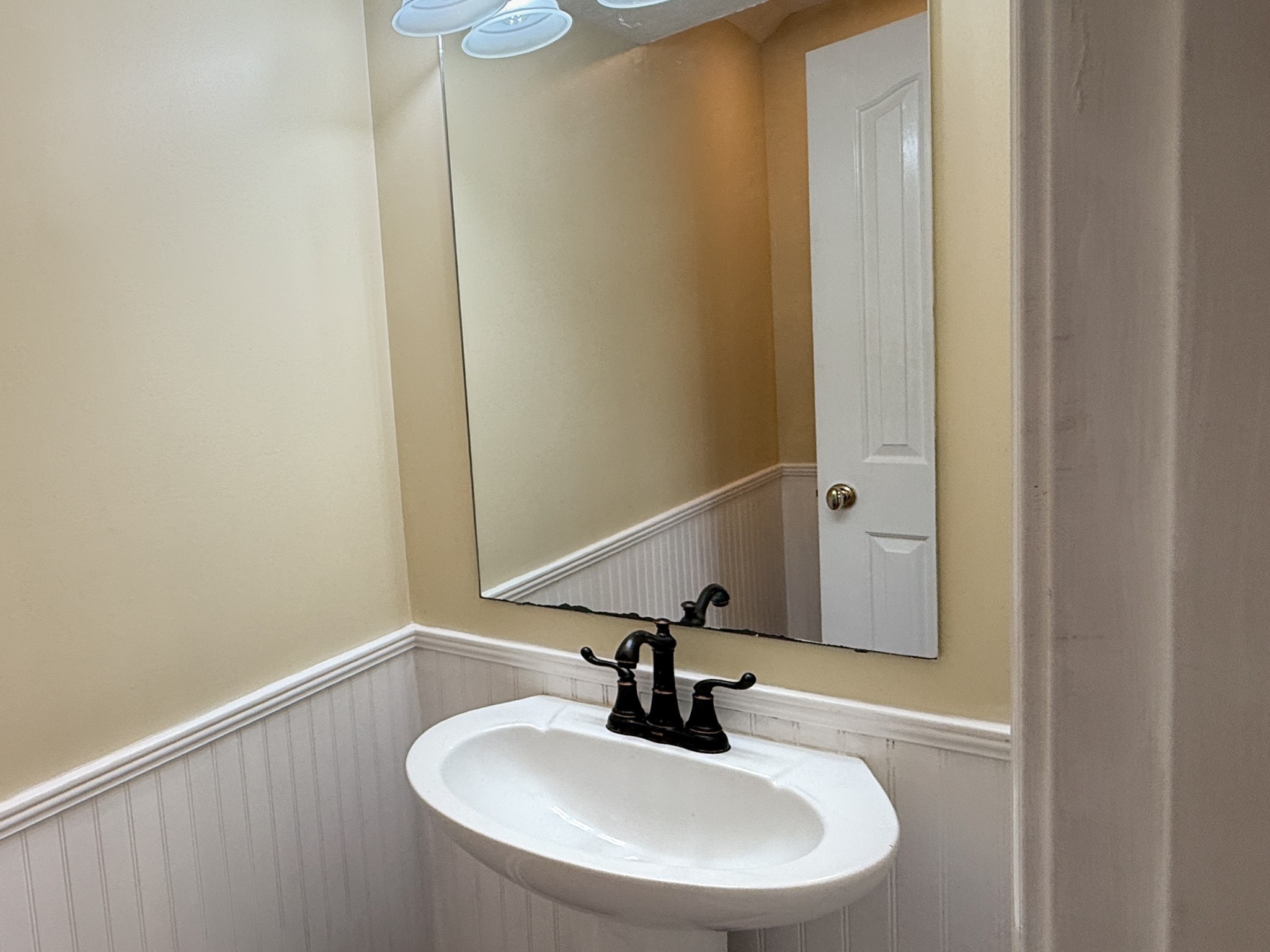 1004 Fall Parkway Murfreesboro, TN 37129 - Photo 12 of 15 a bathroom with a sink and a mirror