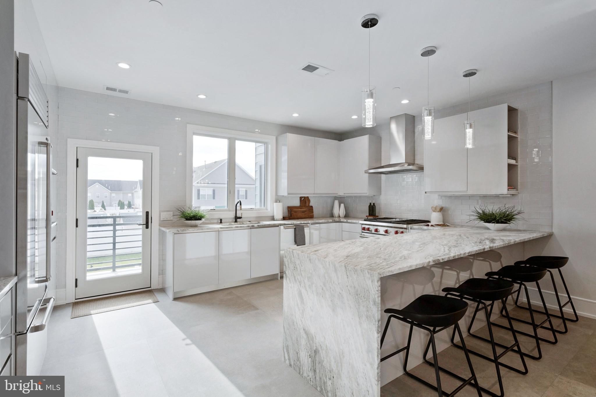 2008 Renaissance Walk, Unit 5 Philadelphia, PA 19145 - Photo 12 of 94 Fabulous kitchen with deck for light, air, BBQ