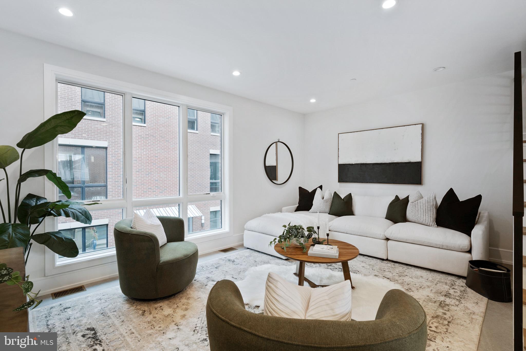 2008 Renaissance Walk, Unit 5 Philadelphia, PA 19145 - Photo 19 of 94 Spacious living room adjacent to dining area