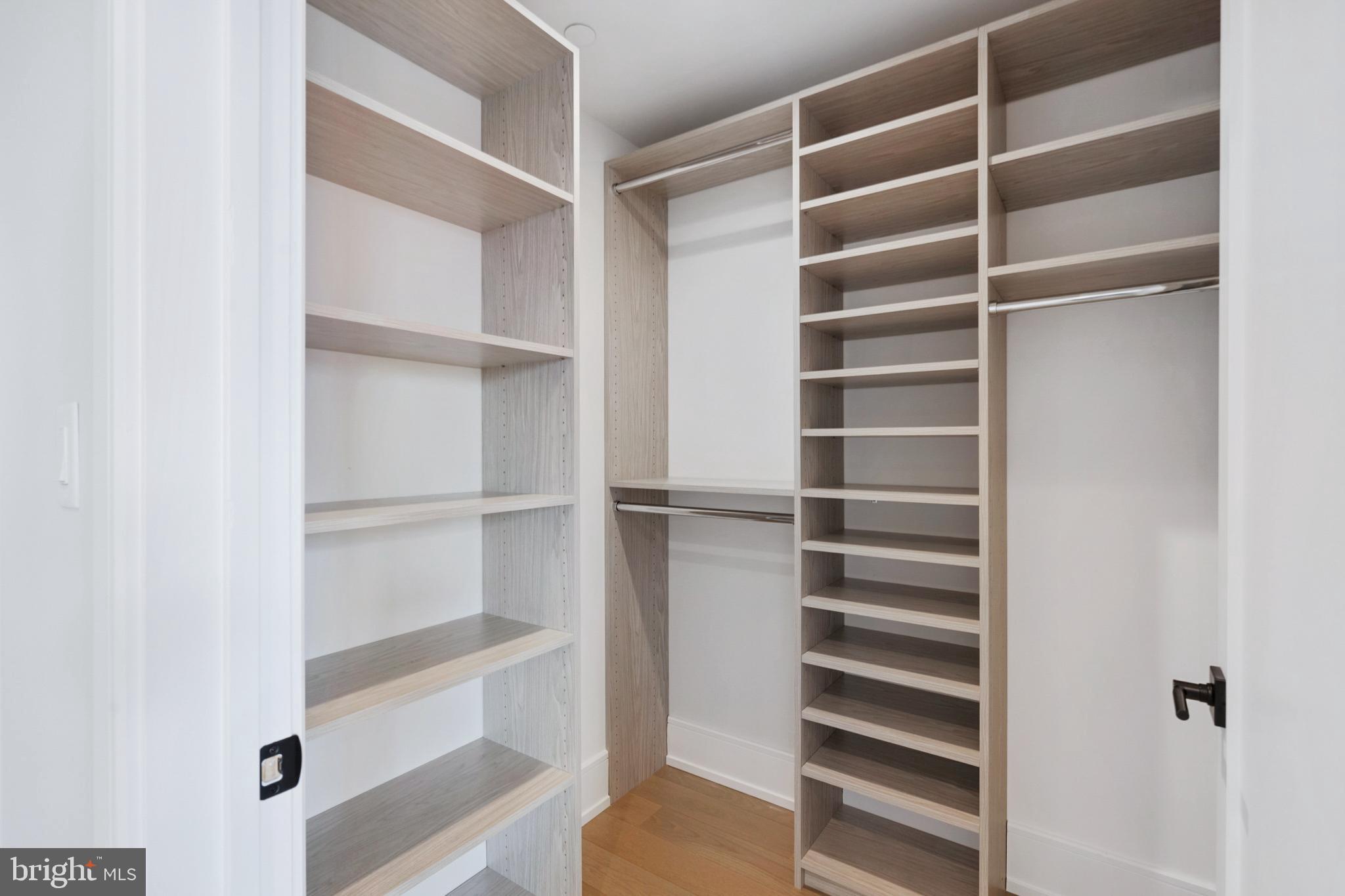 2008 Renaissance Walk, Unit 5 Philadelphia, PA 19145 - Photo 33 of 94 a view of walk in closet with empty racks
