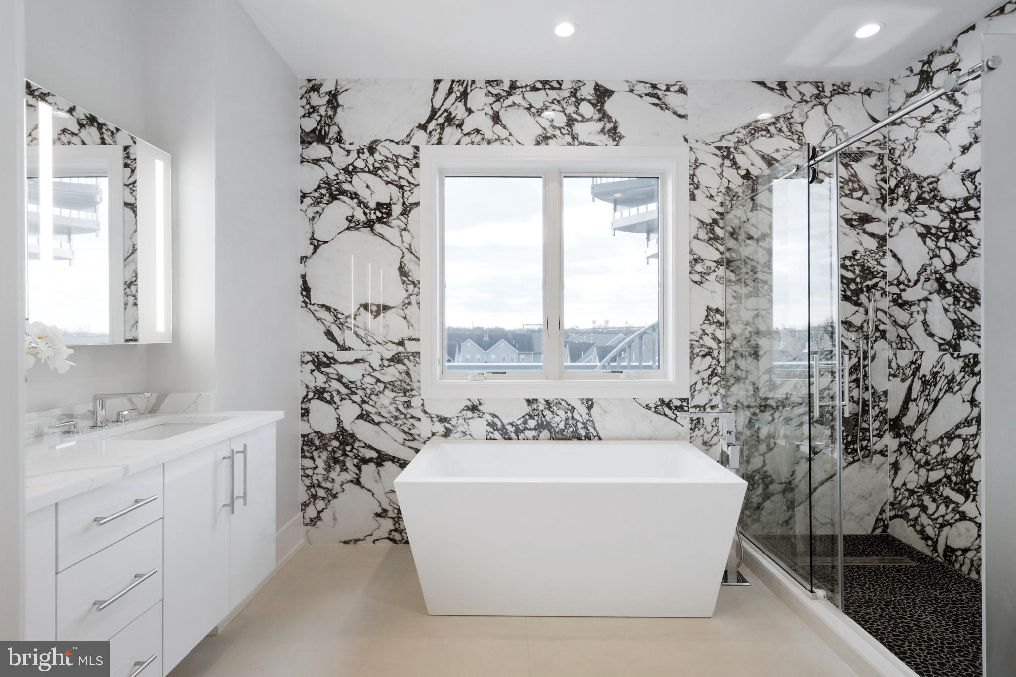 2008 Renaissance Walk, Unit 5 Philadelphia, PA 19145 - Photo 40 of 94 a bathroom with a bathtub and shower