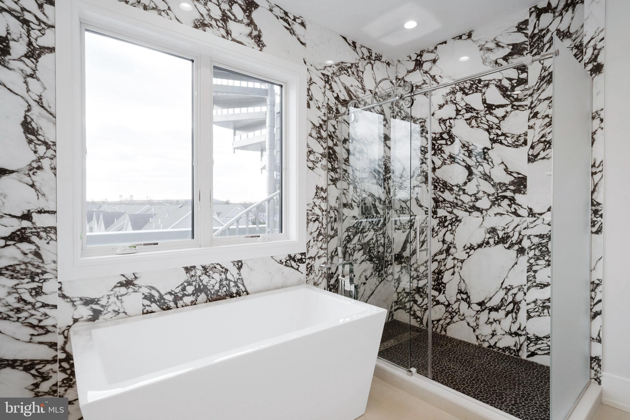 2008 Renaissance Walk, Unit 5 Philadelphia, PA 19145 - Photo 42 of 94 a bathroom with a bathtub and shower