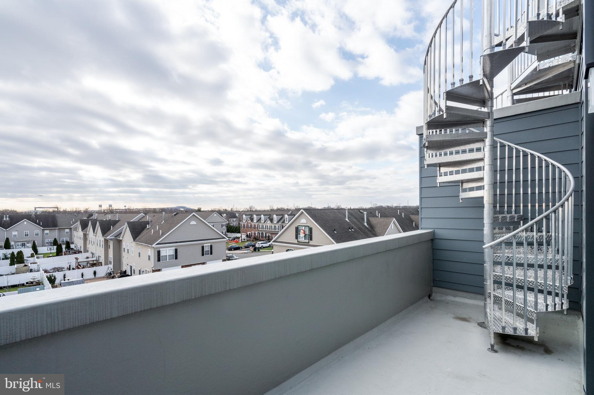 2008 Renaissance Walk, Unit 5 Philadelphia, PA 19145 - Photo 48 of 94 4th floor deck
leading to expansive roofdeck