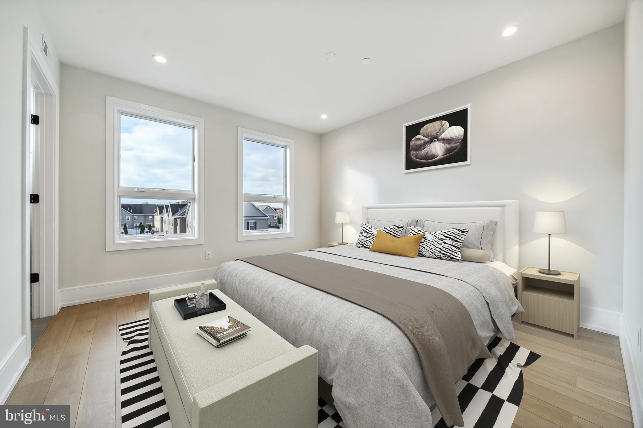 2008 Renaissance Walk, Unit 5 Philadelphia, PA 19145 - Photo 53 of 94 a bedroom with a bed and a window