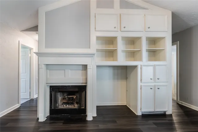 a living room with a fireplace