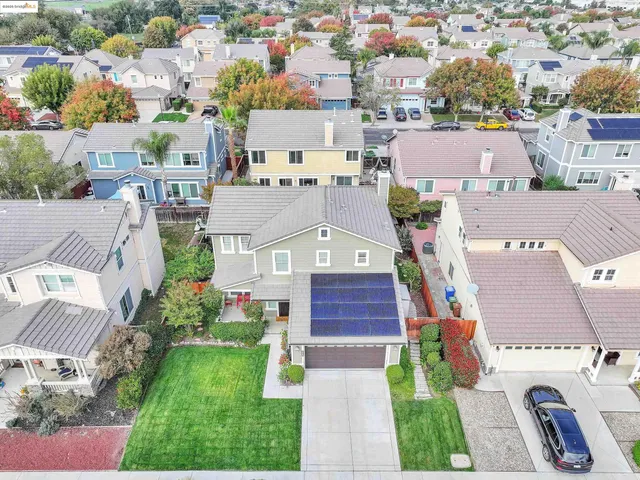 an aerial view of a house with a garden
