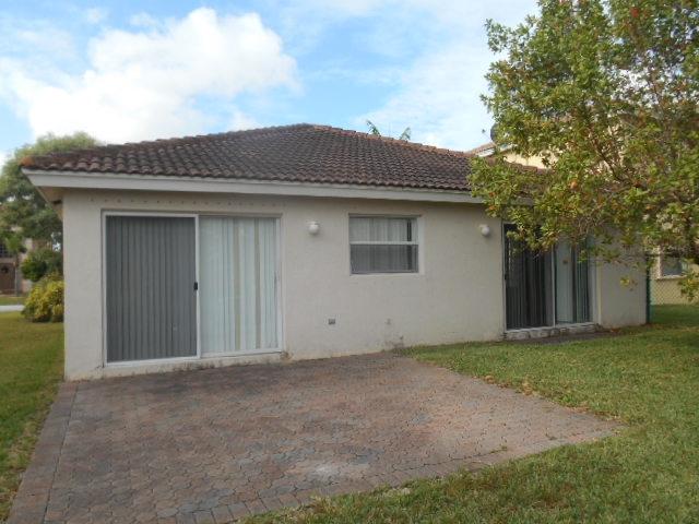 1093 Big Torch Street Riviera Beach, FL 33407 - Photo 28 of 36 Exterior Back