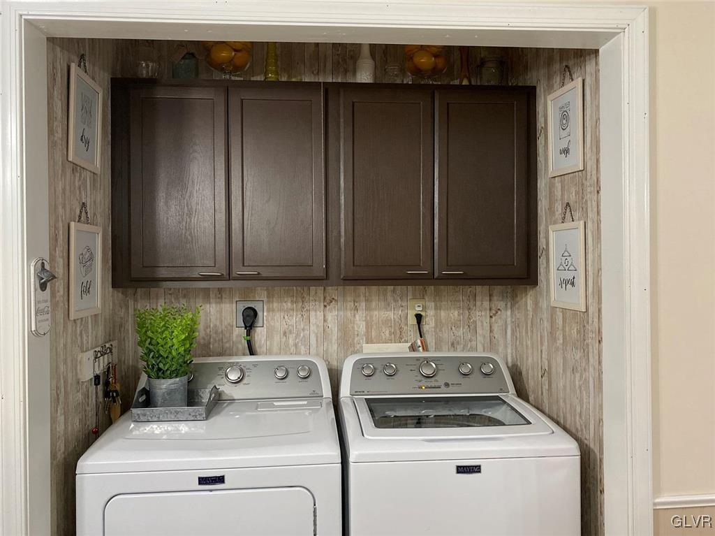142 Colette Lane Dingmans Ferry, PA 18328 - Photo 8 of 14 a utility room with dryer and washer