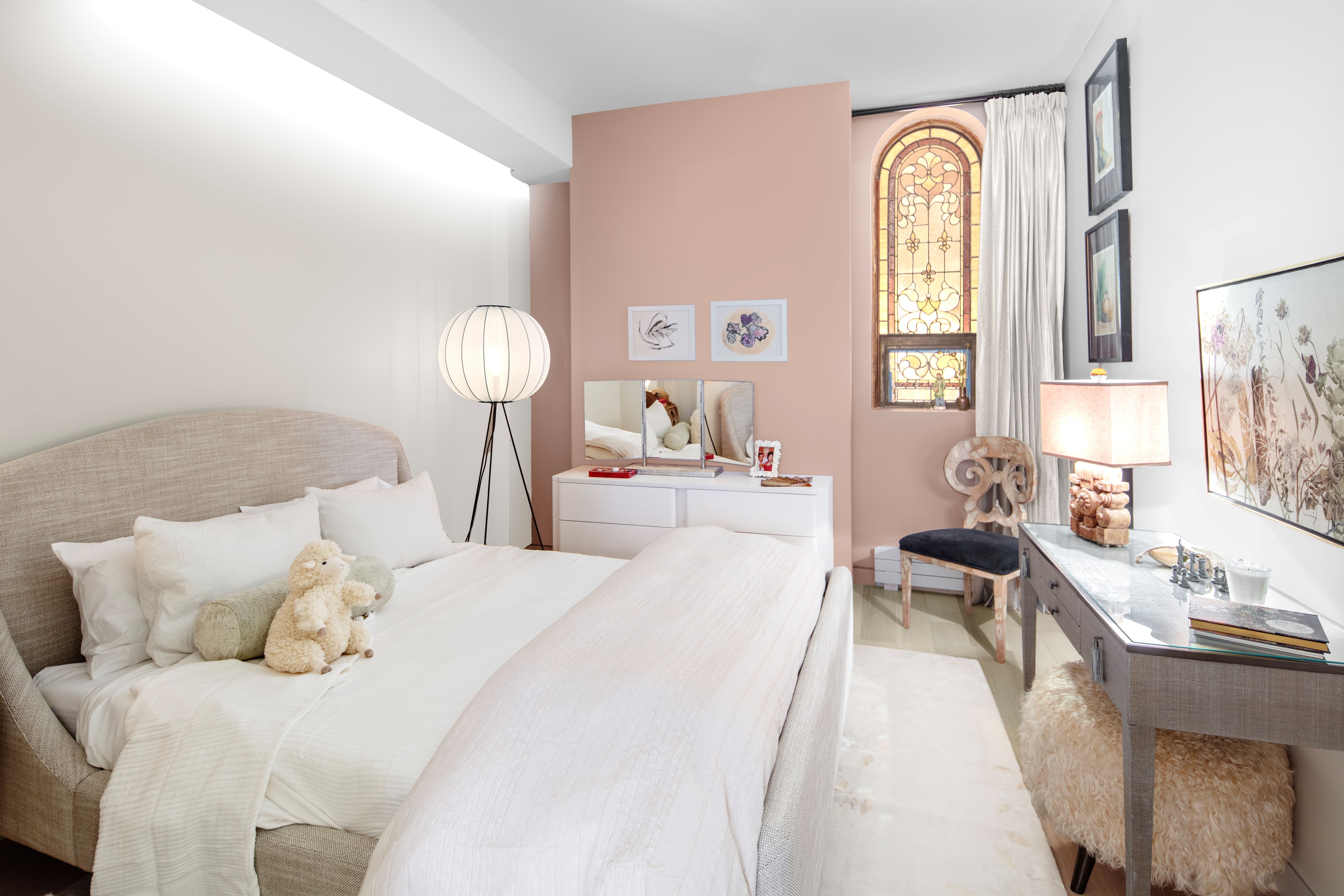 140 West 81st Street, Unit 2B Manhattan, NY 10024 - Photo 12 of 22 a bedroom with a bed and a mirror