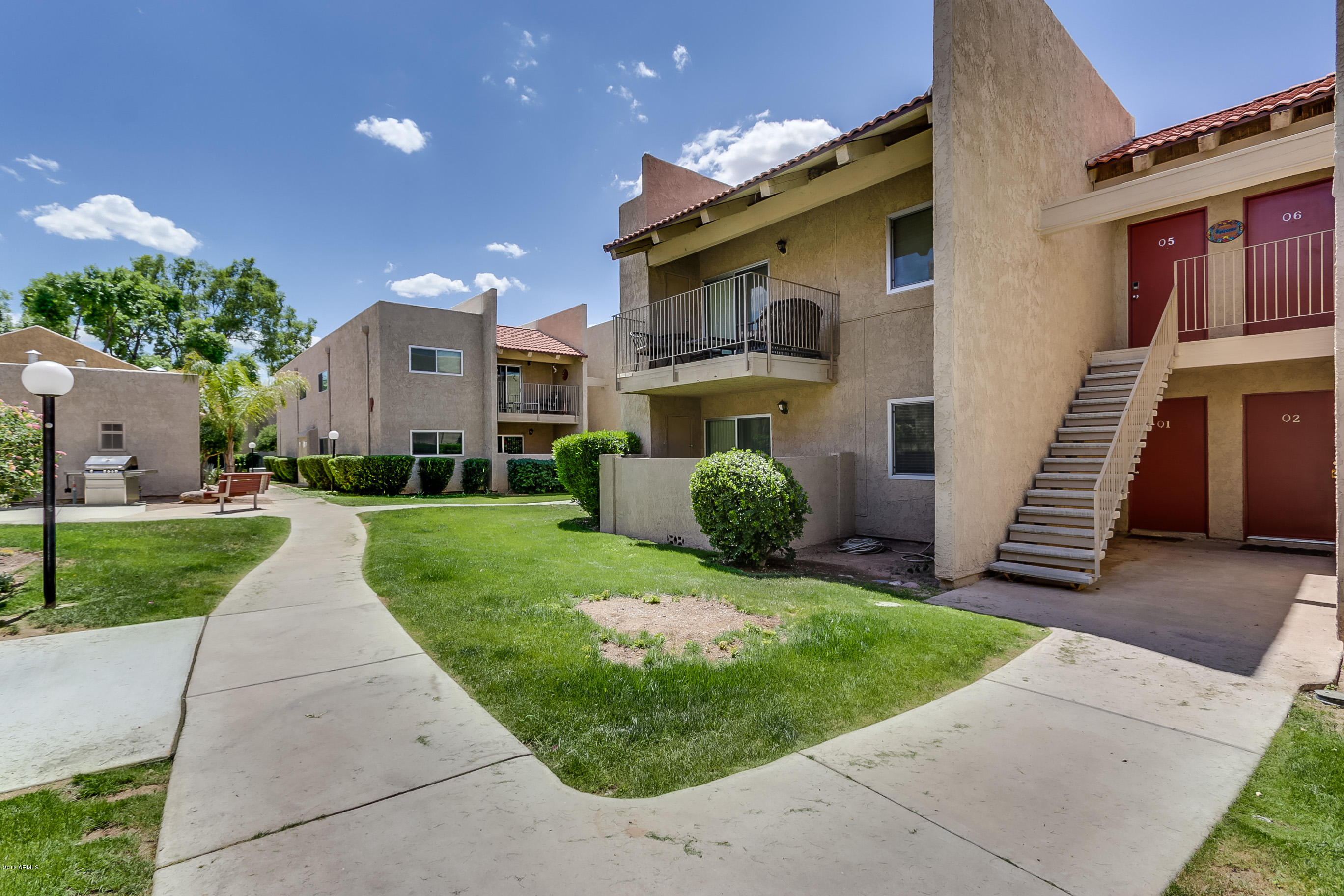 5525 East Thomas Road, Unit Q1 Phoenix, AZ 85018 - Photo 1 of 24 Front of Ground Floor Unit Q1