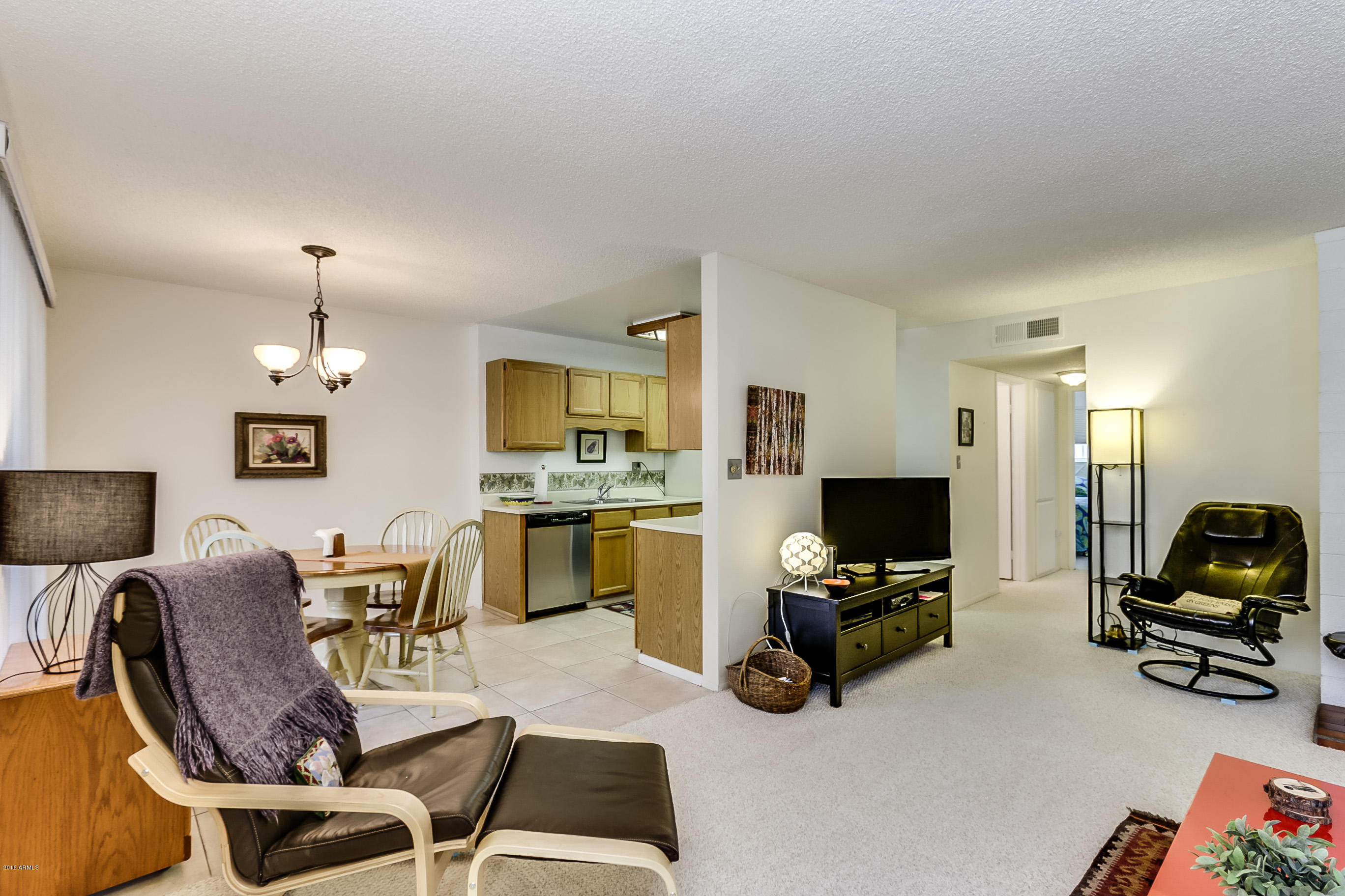 5525 East Thomas Road, Unit Q1 Phoenix, AZ 85018 - Photo 5 of 24 Living Room and Kitchen