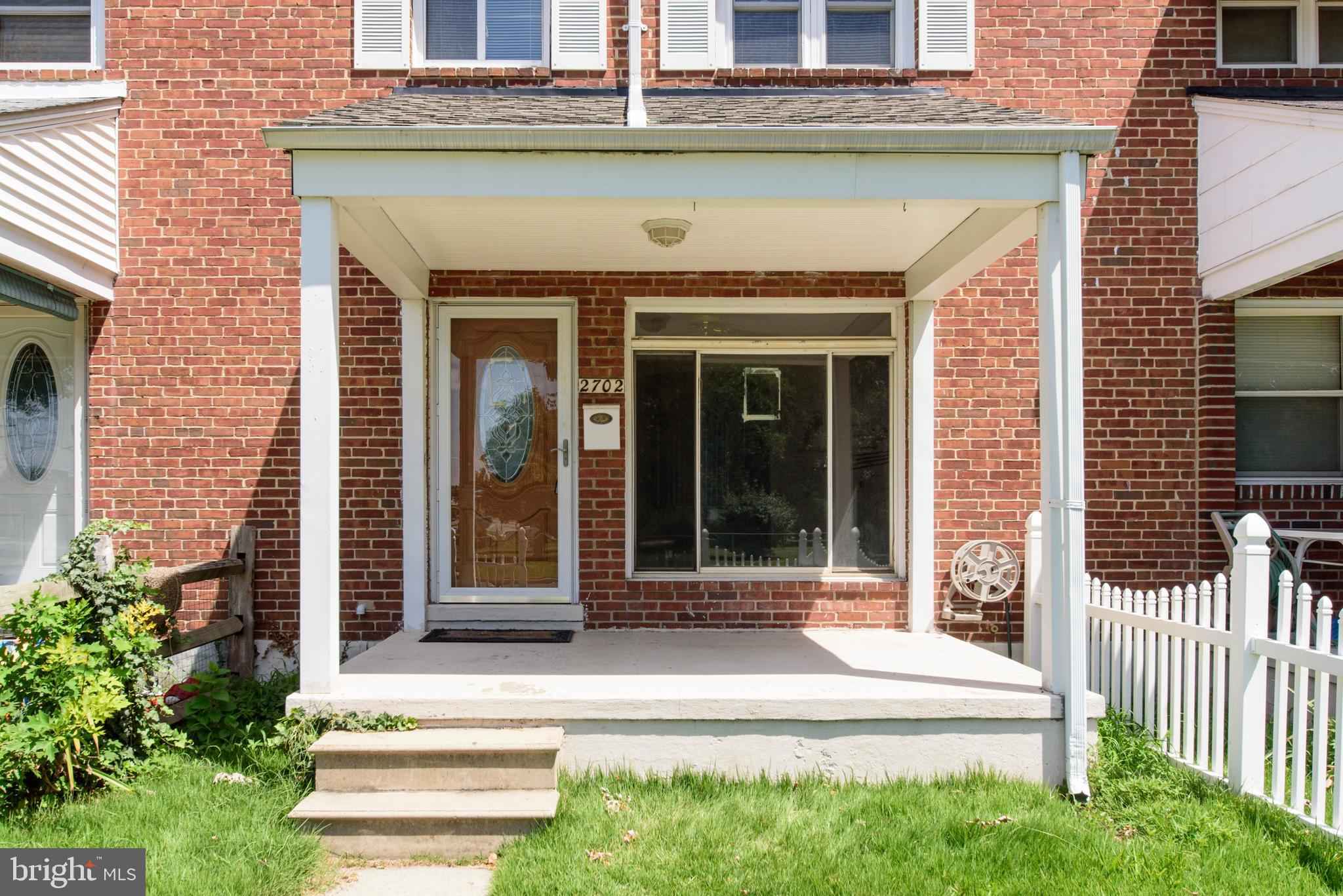 2702 Kirkleigh Road Baltimore, MD 21222 - Photo 2 of 32 a view of a entrance door of the house