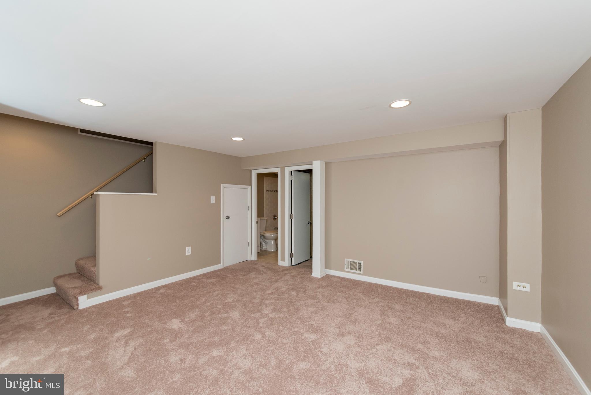 2702 Kirkleigh Road Baltimore, MD 21222 - Photo 27 of 32 a view of an empty room
