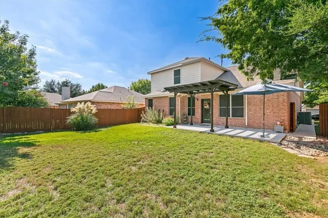 a view of a lake from a yard