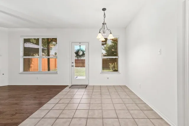 a view of a livingroom with furniture and a fireplace