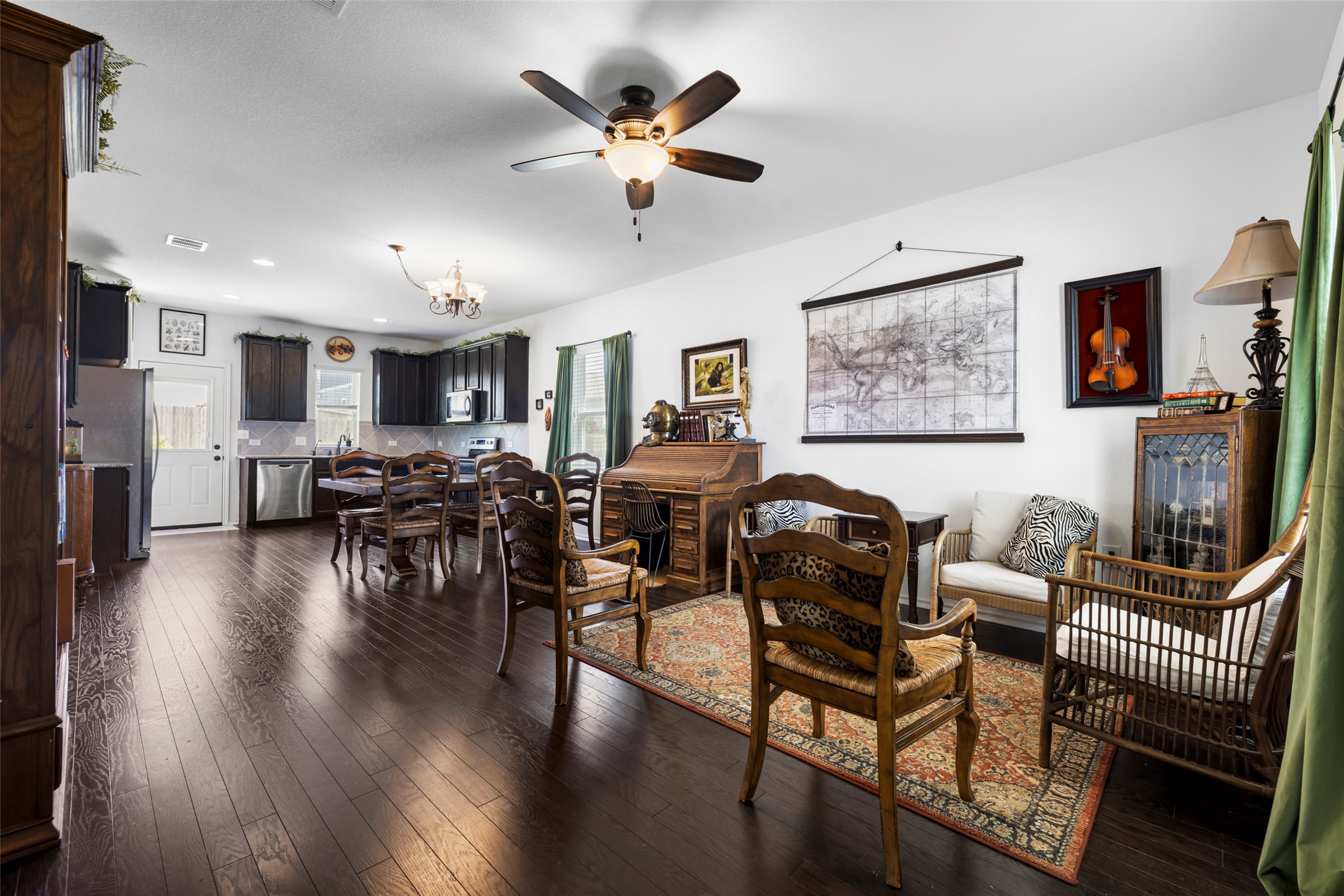 13113 Titanium Street Austin, TX 78754 - Photo 39 of 39 Open floor plan with living, dining and kitchen! Engineered hardwood flooring