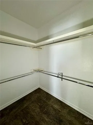 a view of a room with an empty walk in closet