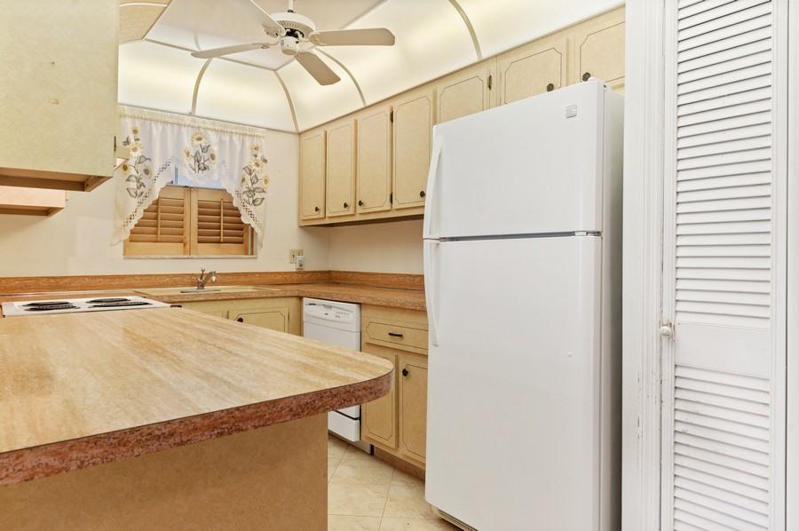 1124 Northwest 13th Street, Unit 114A Boca Raton, FL 33486 - Photo 5 of 15 05_1124-NW-13th-St_114A_5_Kitchen_Web