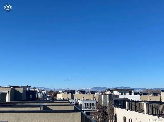 a view of residential houses with city view
