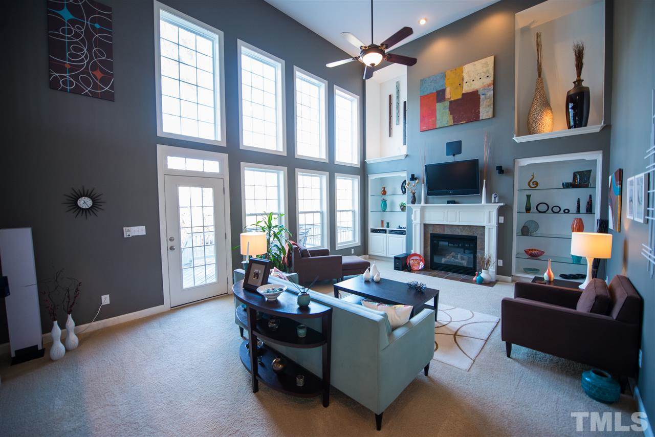 2417 Hagney Street Raleigh, NC 27614 - Photo 12 of 25 Two-story den with grand windows and custom built-ins