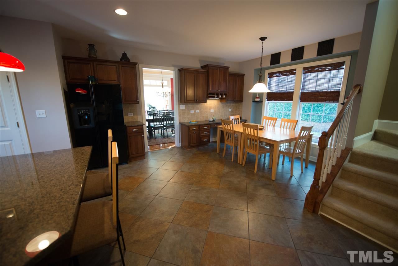 2417 Hagney Street Raleigh, NC 27614 - Photo 10 of 25 Spacious breakfast area for whatever size table you have! Don't miss the built-in homework desk!