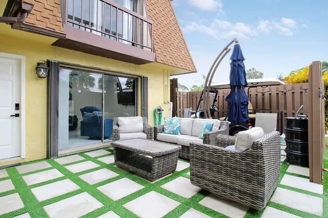 a building outdoor space with patio furniture