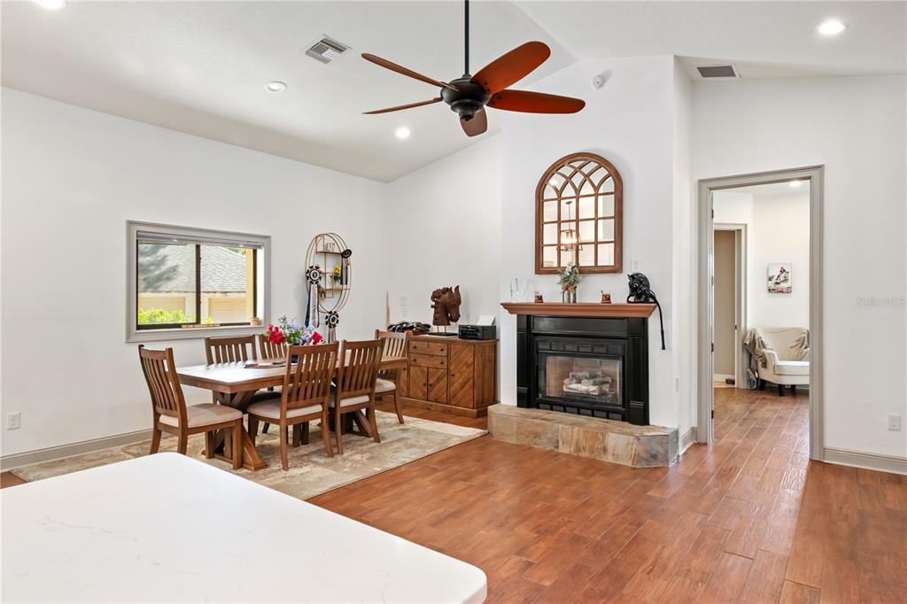 8820 Northwest 130th Street Reddick, FL 32686 - Photo 18 of 67 a view of a livingroom with furniture and a fireplace