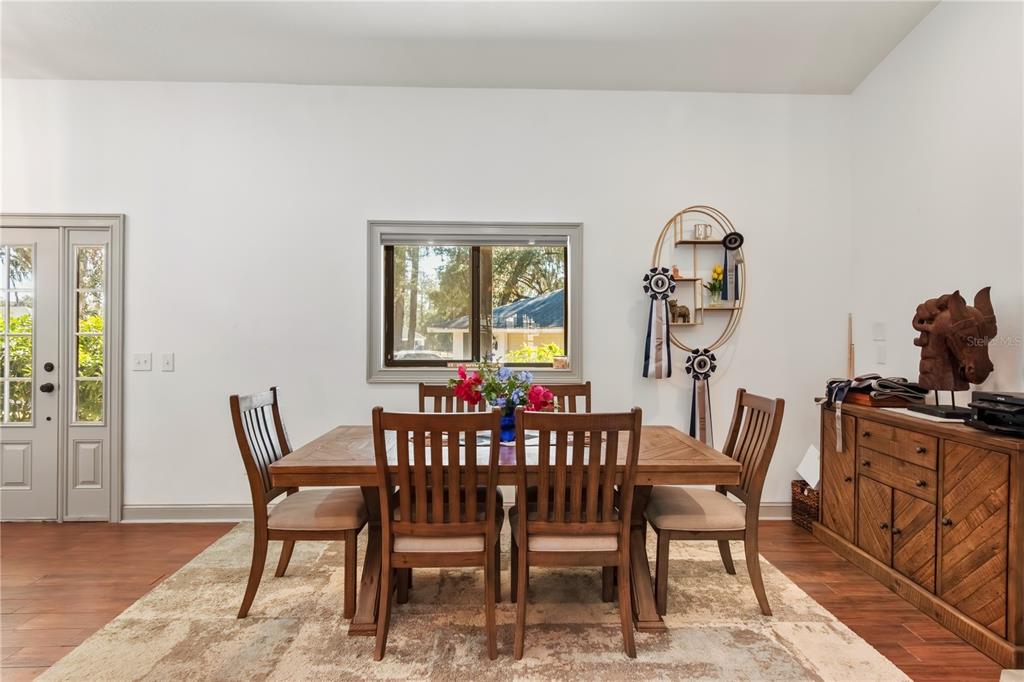 8820 Northwest 130th Street Reddick, FL 32686 - Photo 20 of 67 a view of a dining room with furniture
