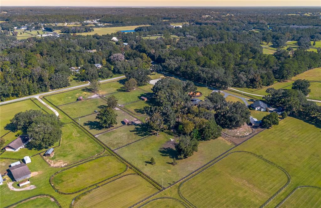 8820 Northwest 130th Street Reddick, FL 32686 - Photo 55 of 67 an aerial view of residential house with outdoor space