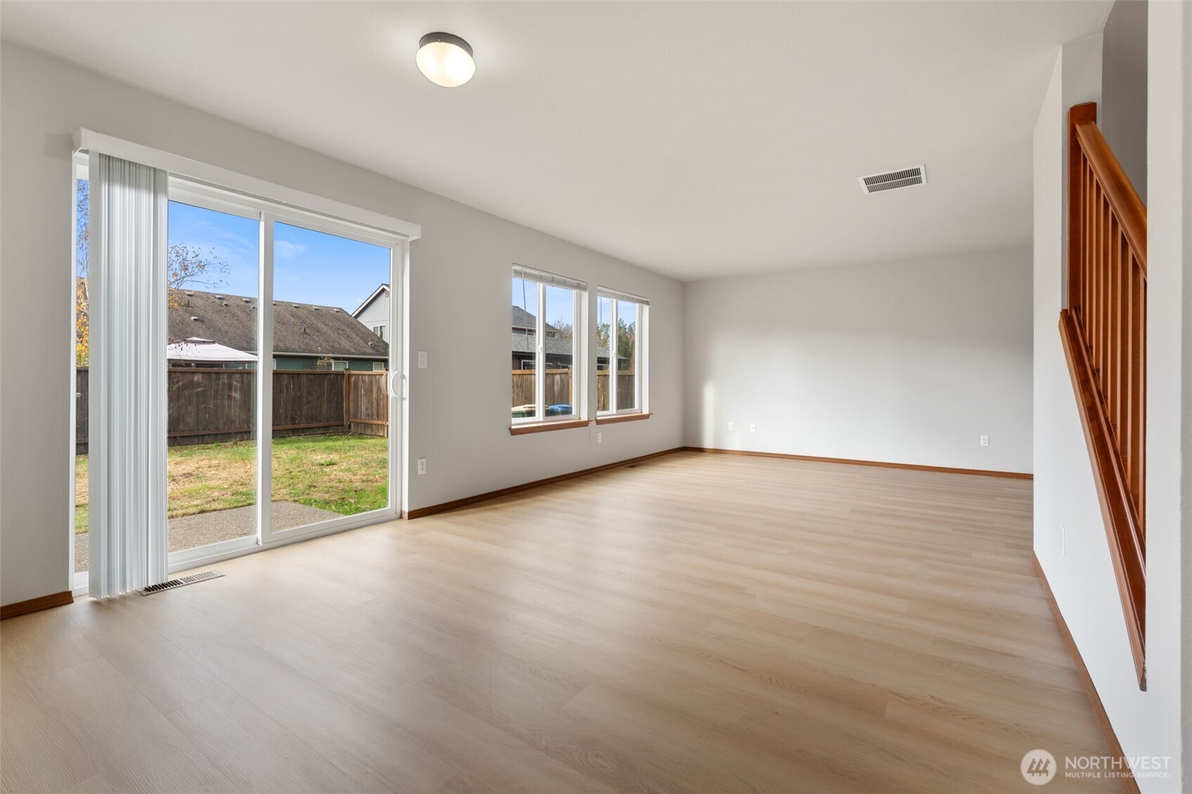 116 Goldmyer Drive Chehalis, WA 98532 - Photo 16 of 38 wooden floor in an empty room with a window