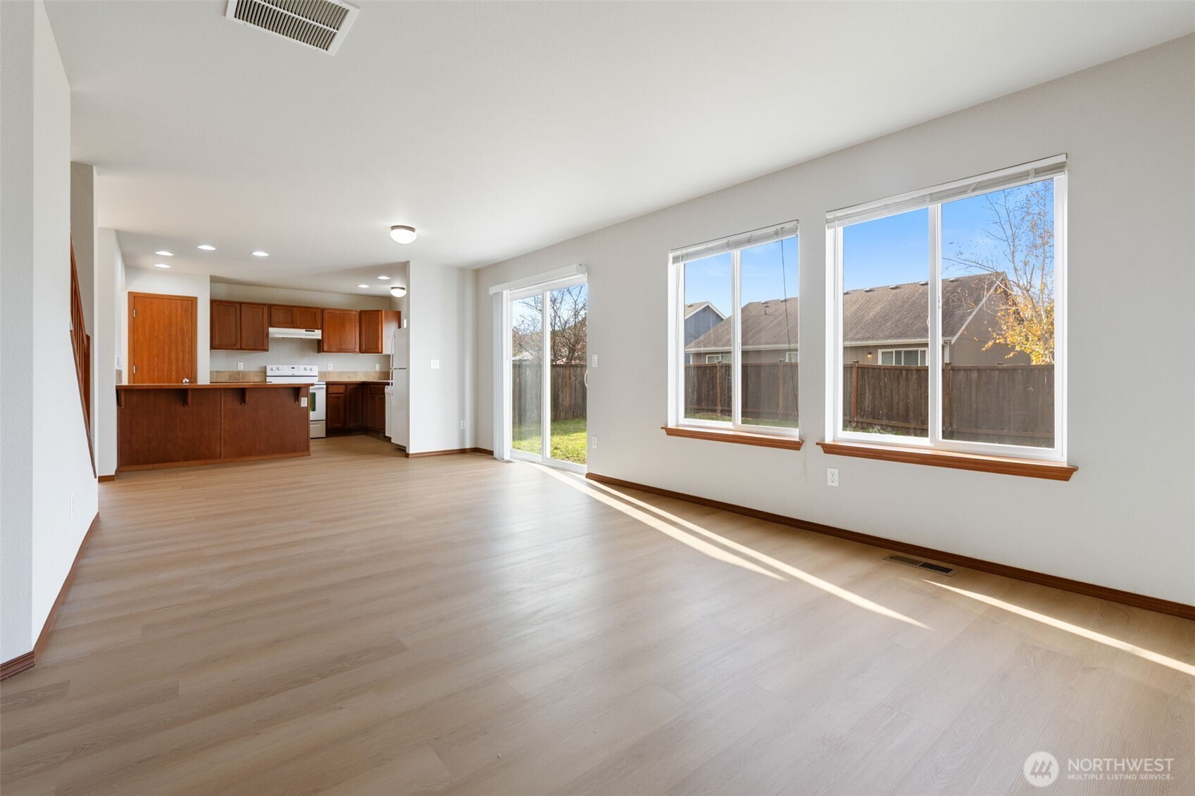 116 Goldmyer Drive Chehalis, WA 98532 - Photo 21 of 38 a view of an empty room with a window and kitchen view