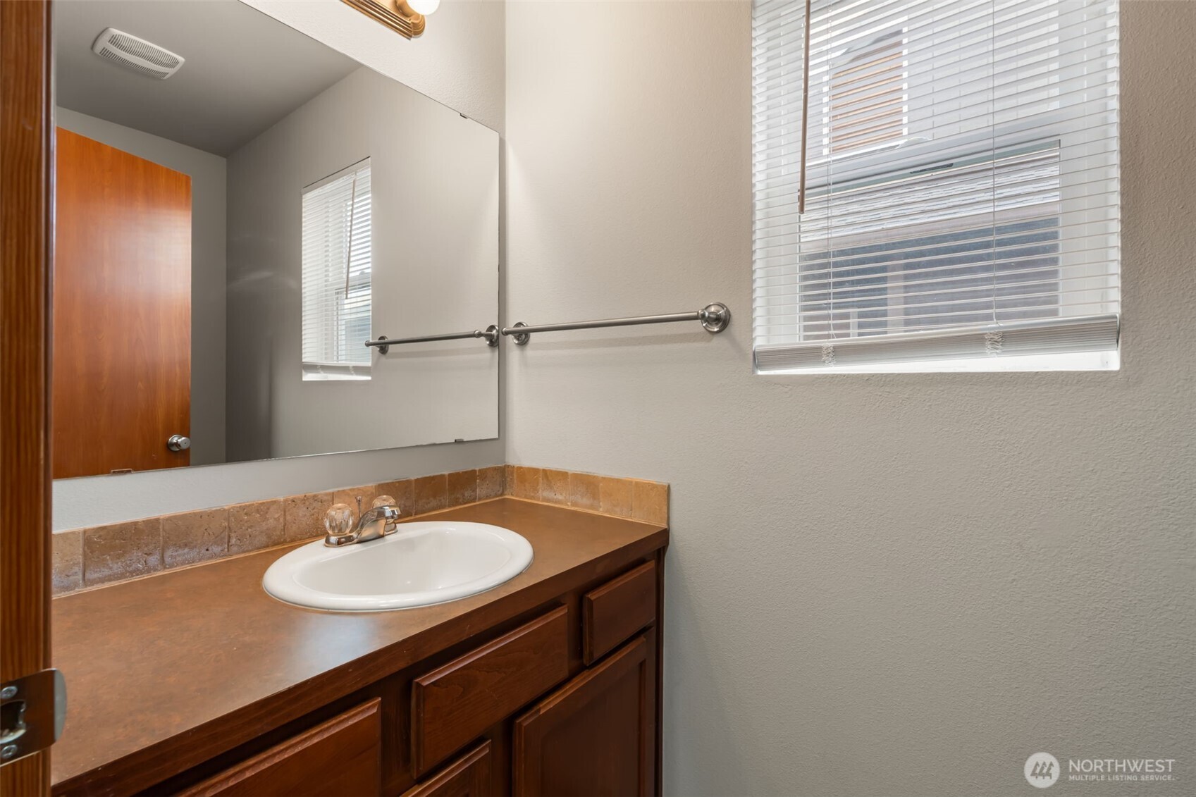 116 Goldmyer Drive Chehalis, WA 98532 - Photo 23 of 38 a bathroom with a sink and a mirror