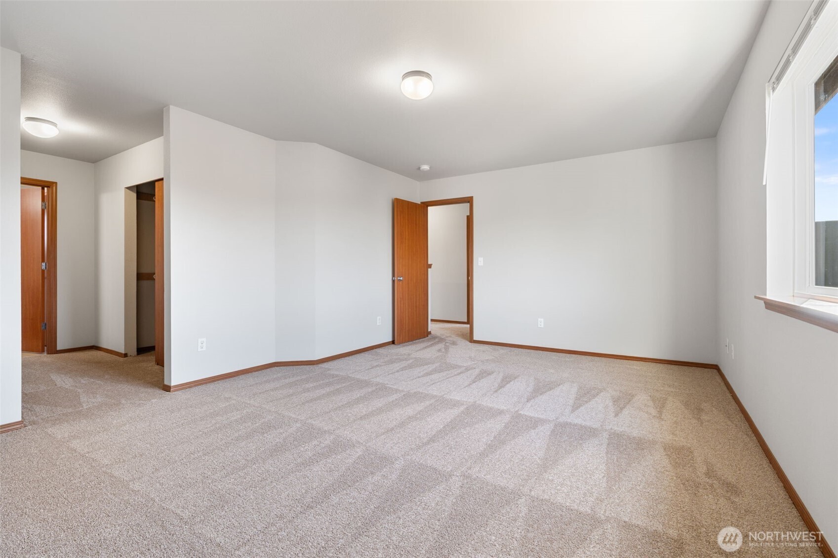 116 Goldmyer Drive Chehalis, WA 98532 - Photo 27 of 38 an empty room with windows and closet